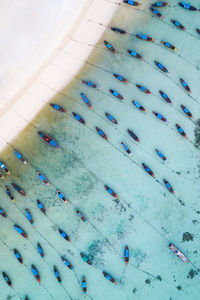 Aerial view of boats moored in sea