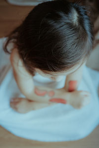 Rear view of woman at home