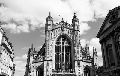 Low angle view of cathedral against cloudy sky