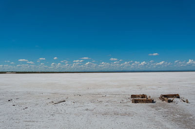 Scenic view of sea against blue sky