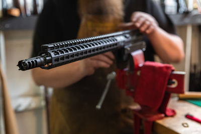 Cropped image of man working at workshop