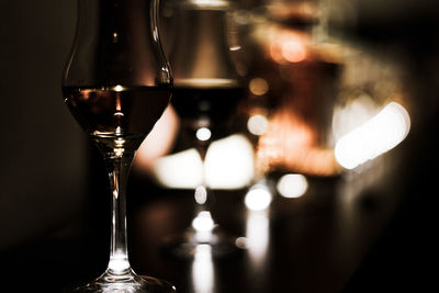 Close-up of wineglass on table