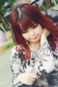 Portrait of young woman smiling