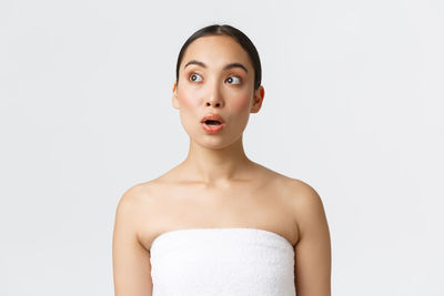 Portrait of beautiful woman over white background