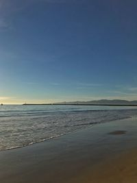 View of beach at sunset