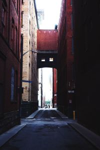 Narrow alley with buildings in background