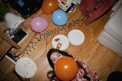 High angle view of woman on table at home