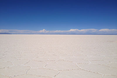 Scenic view of salar de uyuni against clear sky