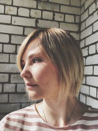 Close-up of young woman looking away