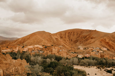 Scenic view of landscape and mountains against sky