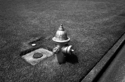 High angle view of electric lamp on field
