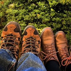 Low section of woman wearing shoes