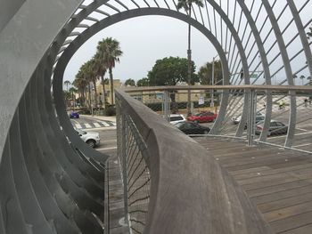 Cars moving on road against clear sky
