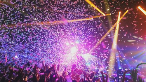 Confetti falling on crowd at concert