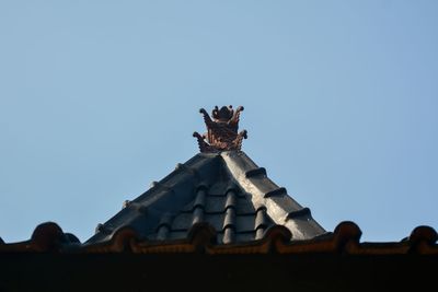 Low angle view of statue against clear sky