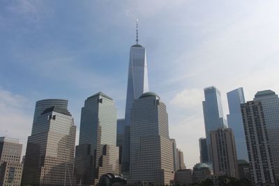 Low angle view of skyscrapers against sky