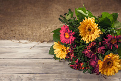 High angle view of flower bouquet on wooden table