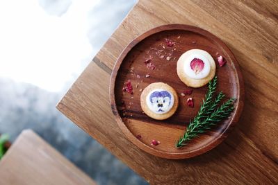 Directly above shot of cookies in plate on table