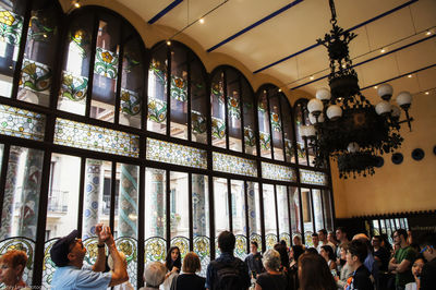 Group of people in illuminated room