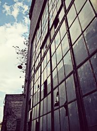 Low angle view of modern building against sky