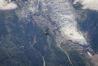 Aerial view of overhead cable car above mountains