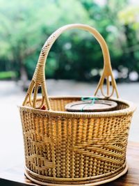 Close-up of wicker basket on table