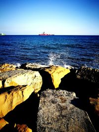 Scenic view of sea against clear sky