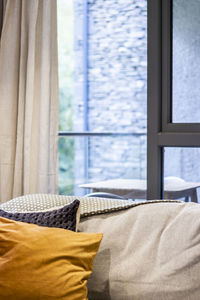 Close-up of blanket on bed at home