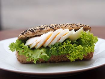 Close-up of egg sandwich in plate on table