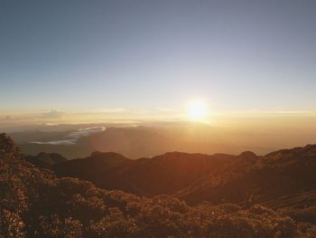 Scenic view of mountains against sky during sunset