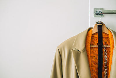 Close-up of clothes hanging on wall