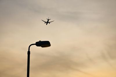 Low angle view of street light against sky