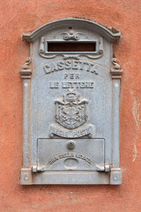 Close-up of mailbox on wall