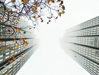 Low angle view of skyscraper against clear sky