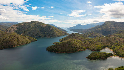 Aerial view of lake and mountains on the background of clouds. sri lanka.