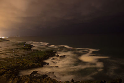 Scenic view of sea against sky at sunset