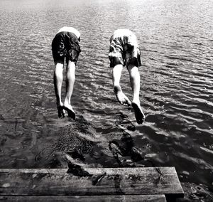 Reflection of woman in water