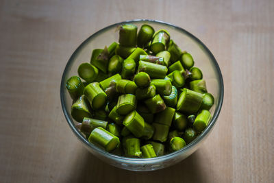 High angle view of chopped vegetables in bowl on table