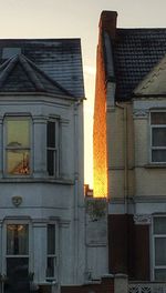 Low angle view of buildings against clear sky