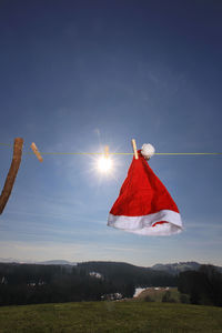 Santa claus hat against sky