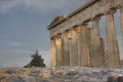 Low angle view of old ruin building against sky