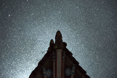 Low angle view of building against sky at night