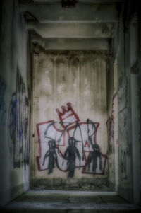 Graffiti on wall of abandoned building