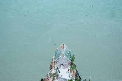 High angle view of traditional building by sea