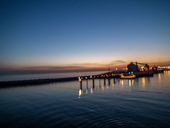 Scenic view of sea against sky at night
