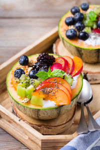 Close-up of chopped fruits on table