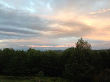 Scenic view of landscape against cloudy sky