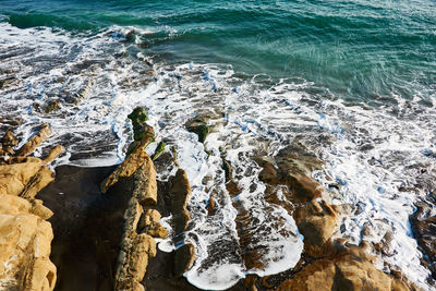 High angle view of rocks on beach