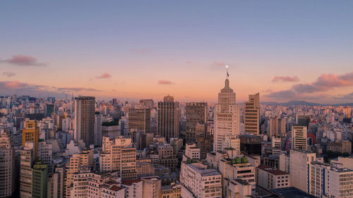 View of cityscape against sky during sunset