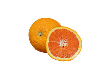 Close-up of orange slice against white background